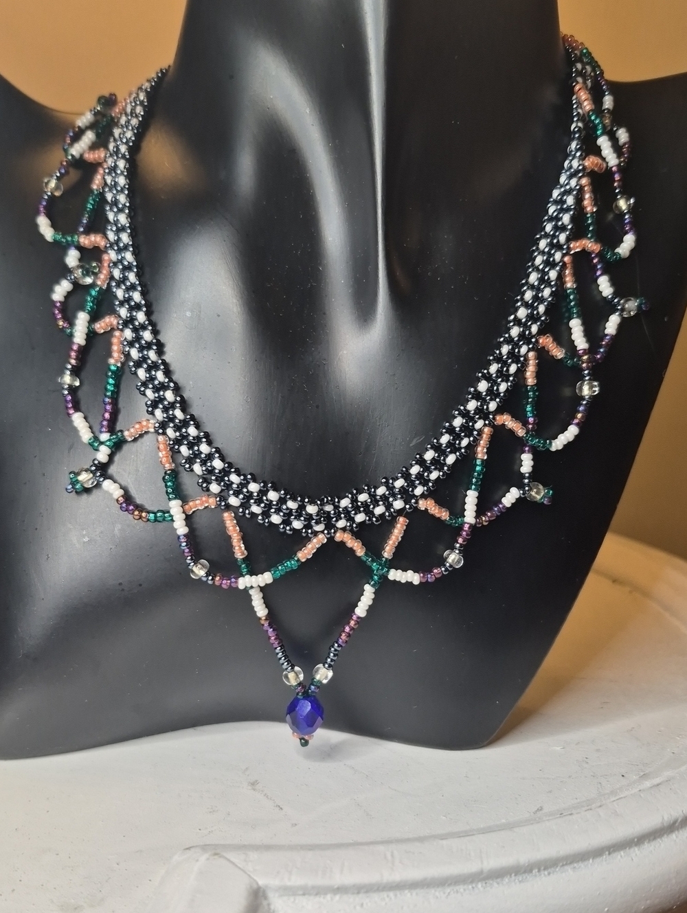 Handcrafted Artisan Multi-Color Seed Bead Necklace with Navy Pendant